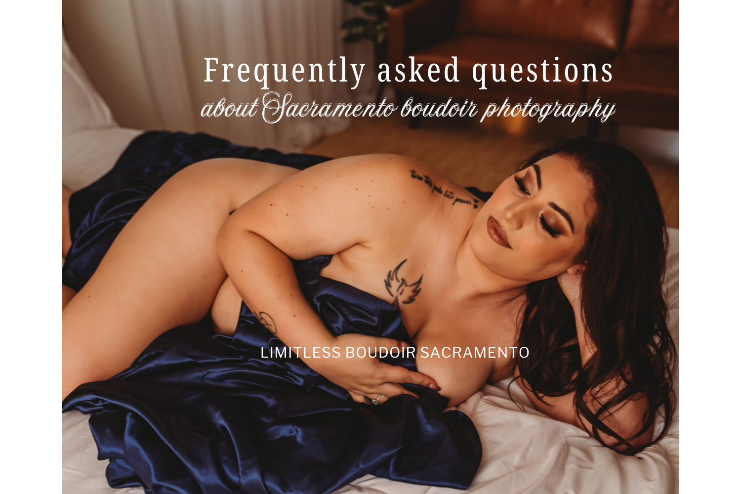 sacramento boudoir photography woman laying in blue sheet on bed